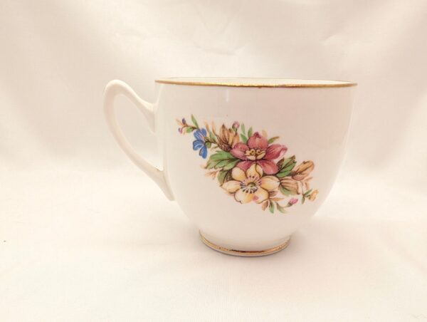 Bone China Teacup & Saucer, England. Delicate Floral Pattern, Gilt Trim