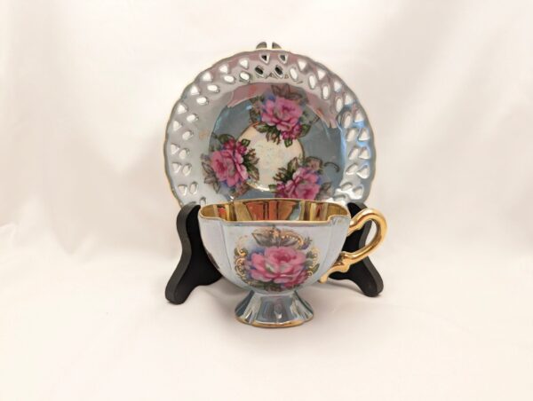 Vintage Ainsley blue teacup & saucer with pink roses & gilt details