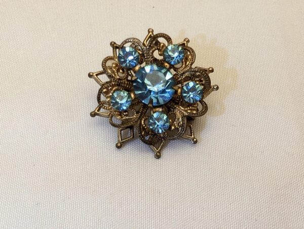 Vintage Mid-Century Floral Starburst Brooch - Blue Rhinestones, Brass Filigree, Unmarked