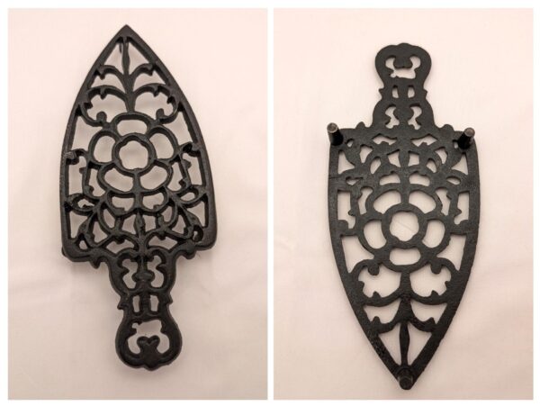 Vintage cast iron trivets: footed pot rests, wall-mounted