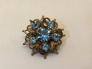 Vintage Mid-Century Brooch: Floral Starburst, Blue Rhinestones, Brass Filigree