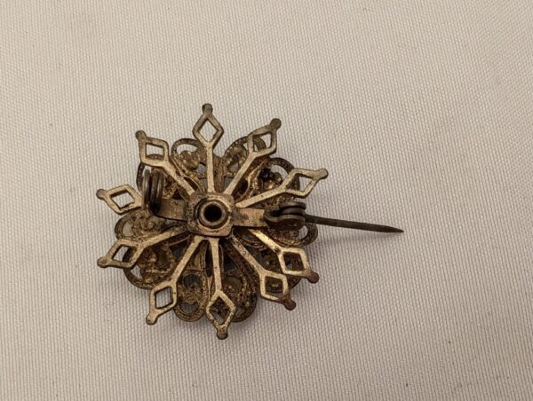 Vintage Mid-Century Brass Starburst Brooch with Blue Rhinestones