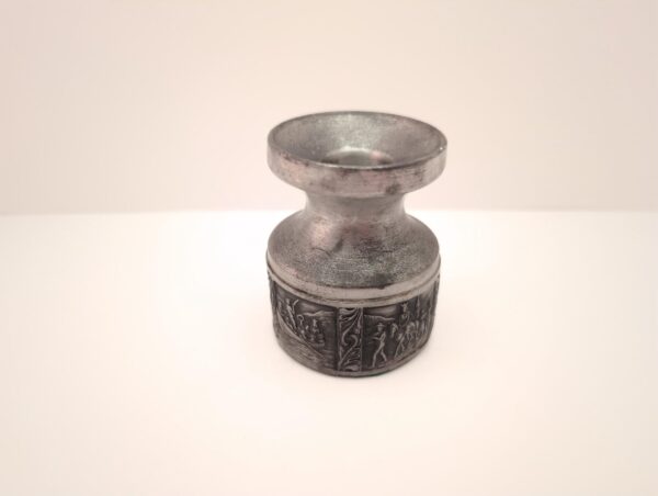 Engraved wedding procession on vintage pewter candlestick