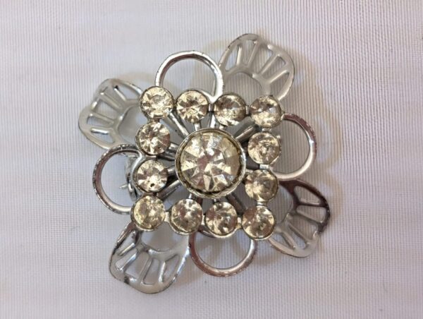 Vintage MCM Brooch: Silver loops, mixed rhinestones, retro design